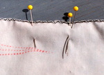 Two pins at hip